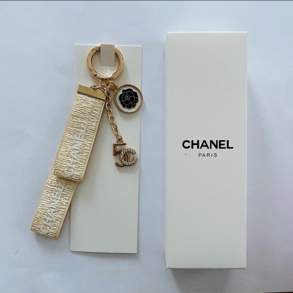 Brand New Chanel VIP Champagne Metallic Ribbon Rhinestone Key Chain Bag Charm